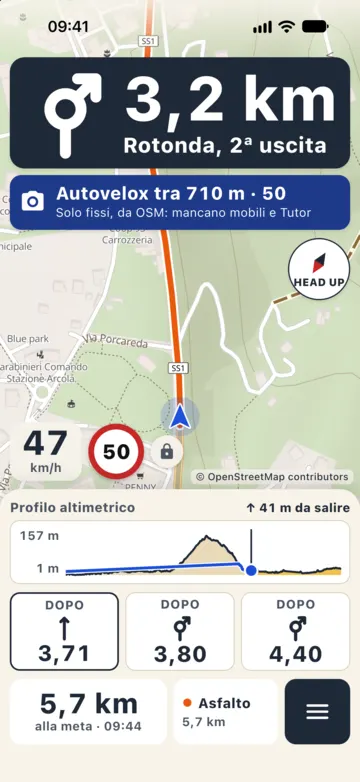 Guida sull'Aurelia SS1 verso Sarzana: avviso «Autovelox tra 710 m · 50» con la nota «Solo fissi, da OSM: mancano mobili e Tutor», velocità 47 km/h con il limite 50.