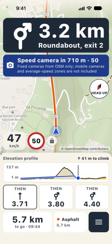 Riding on the Aurelia SS1 towards Sarzana: warning "Speed camera in 710 m · 50" with the note "Fixed cameras from OSM only; mobile cameras and average-speed zones are not included", speed 47 km/h with a 50 limit.